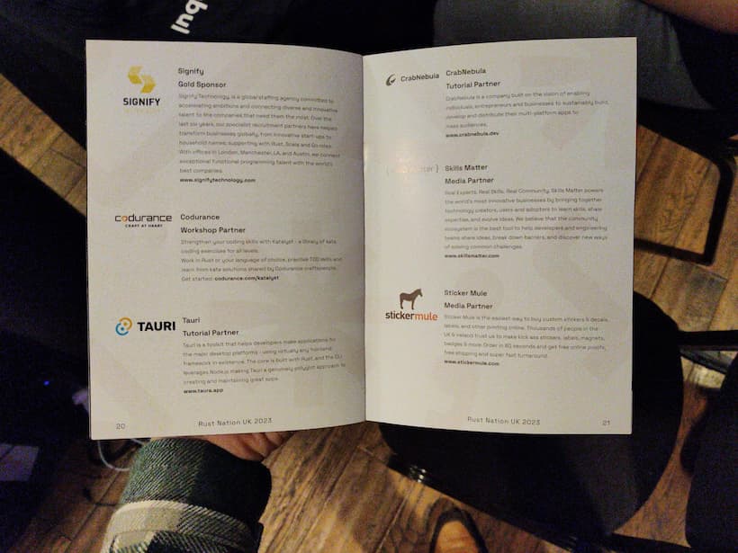 The Rust Nation UK booklet showcasing CrabNebula as a partner.